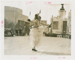 Queens, Borough of - Woman dancing during Queens Week