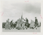 Queens, Borough of - Performance of men and women in traditional dress