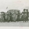 Queens, Borough of - Performance of men and women in traditional dress