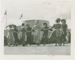 Queens, Borough of - Performance of men and women in traditional dress