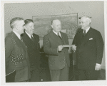 Queens, Borough of - Harvey Gibson receiving check for Queensborough Host House rent