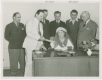 Red Cross worker receiving check