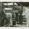 Radio Corporation of America (RCA) - Group standing in construction site with television
