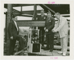 Radio Corporation of America (RCA) - Group standing in construction site with television