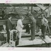 Radio Corporation of America (RCA) - Group standing in construction site with television