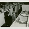 Railroads on Parade - Grover Whalen and woman look at models