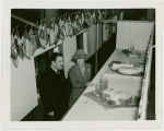 Railroads on Parade - Grover Whalen and woman look at models