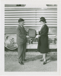 Railroads on Parade - One-millionth visitor to Budd Exhibit receiving plaque