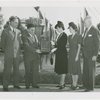 Railroads on Parade - One-millionth visitor to Budd Exhibit with group receiving plaque