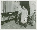 Railroads on Parade - George O'Brien (RKO Western star) looking at wagon