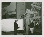 Remington Rand Exhibit - Frank Buck and Lou Lehr shaving elephant with giant Remington Rand shaver