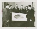 Restaurants - Grover Whalen and group holding sketch of Casino of Nations