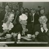 Restaurants - Cobina Wright, Mrs. George Washington Kavanaugh, and Elmer eating at restaurant