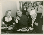 Restaurants - Cobina Wright, Mrs. George Washington Kavanaugh, and Harry Carey eating at restaurant