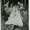 Restaurants - Group using chopsticks at table