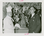Restaurants - Childs - George D. Strohmeyer (President of Childs Company) and chef with Trylon and Perisphere chicken croquette and mashed potatoes