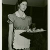 Restaurants - Childs - Childs waitress holding tray with food on it