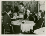 Restaurants - Childs - Childs waitress serving food to family