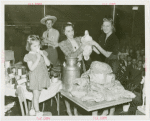 Restaurants - Schlitz Palm Garden - Women holding duck, child looks on