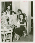 Restaurants - Schlitz Palm Garden - Woman holding duck, children look on
