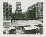 Russia (USSR) Participation - Building - Construction - Raising of flag on steelwork and crowd