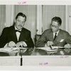 Siam official and Grover Whalen signing contracts