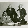 Spanish officials and Grover Whalen signing contract