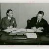 Southern Rhodesia official and Grover Whalen signing contract