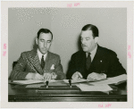 Southern Rhodesia official and Grover Whalen signing contract
