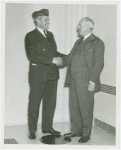 Special Days - American Legion Day - Member and Harvey Gibson shaking hands