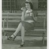 Special Days - Hot Dog Day - Winner of Most Beautiful Waitress contest eating hot dog