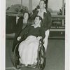 Special Days - Infantile Paralysis Day - Man and woman pushing man in wheelchair