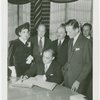 Special Days - Inventors' Day - Man signing guestbook book