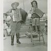 Special Days - Music Merchants Day - Man and young girl playing accordion