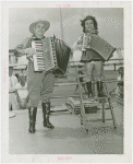 Special Days - Music Merchants Day - Man and young girl playing accordion