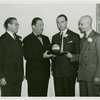 Special Days - Pan-American Day - Grover Whalen giving Silvino Da Silva trophy shaped like Trylon and Perisphere while Benjamin Namm and John Cashmore look on