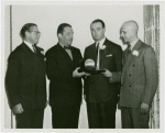 Special Days - Pan-American Day - Grover Whalen giving Silvino Da Silva trophy shaped like Trylon and Perisphere while Benjamin Namm and John Cashmore look on