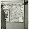 Special Days - Pan-American Day - Woman looking at newspaper exhibit in Inter-America House