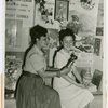 Special Days - Pan-American Day - Women examining crafts in Inter-American House
