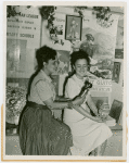 Special Days - Pan-American Day - Women examining crafts in Inter-American House