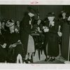 Special Days - Rural Women's Day - Woman presenting Eleanor Roosevelt with orchids