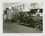 Special Days - Suffolk County Day - Men in fire truck pulling wagon