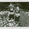Special Weeks - Tulip Week - Girls in costumes looking at tulips