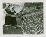 Special Weeks - Tulip Week - Women in costumes looking at tulips