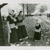 Special Weeks - Tulip Week - Women and child in costumes in tulip bed