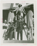 Speeches - Man giving speech in front of statue of George Washington