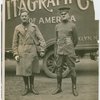 Sports - Two men in uniforms in front of [V]itagraph Co. truck.