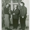 Sports - Harvey Gibson with two men