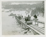 Sports - Hannes Schneider going up ski lift in North Conway, N.H.