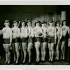 Sports - Women in Trylon and Perisphere sweaters holding sports equipment